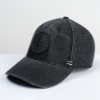 Black denim hat viewed from the side.