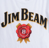 Close-up of the front illustration of the tank top. It is written "Jim Beam" in black, with a red symbol under.