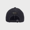 Back of the hat. It’s still black denim, with a small black rectangle written “Baker’s” in white.