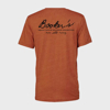 Back of the orange t-shirt. The top-center has large black letters writing “Booker’s”. Underneath it, it is written “Small batch bourbon collection”.