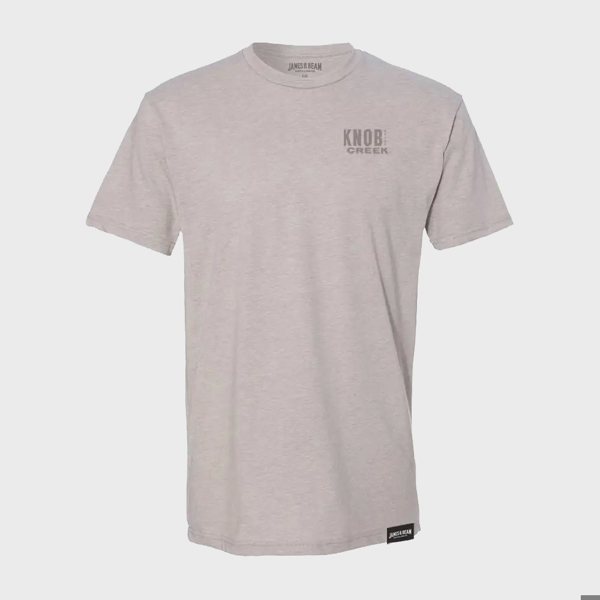 A light-gray t-shirt, with “Knob Creek” written in gray on the left peck.