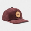 Basil Hayden brown corduroy hat with leather and brass snap closure