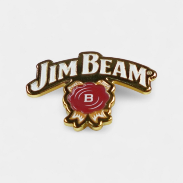 Jim Beam enamel pin featuring the brand logo and red seal design