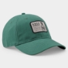 Angled view of the Knob Creek Green Patch Cap showing the textured green fabric, curved brim, and vintage Knob Creek patch.