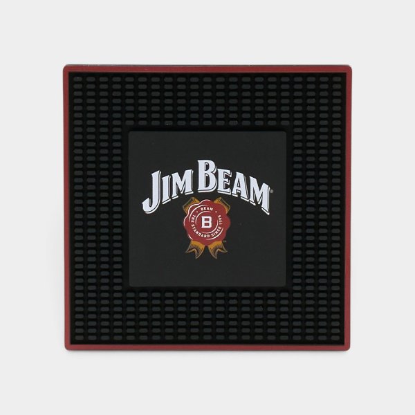 Top view of the Jim Beam Bar Mat Coaster featuring a textured black surface, red border, and white Jim Beam logo with signature red seal at the center.